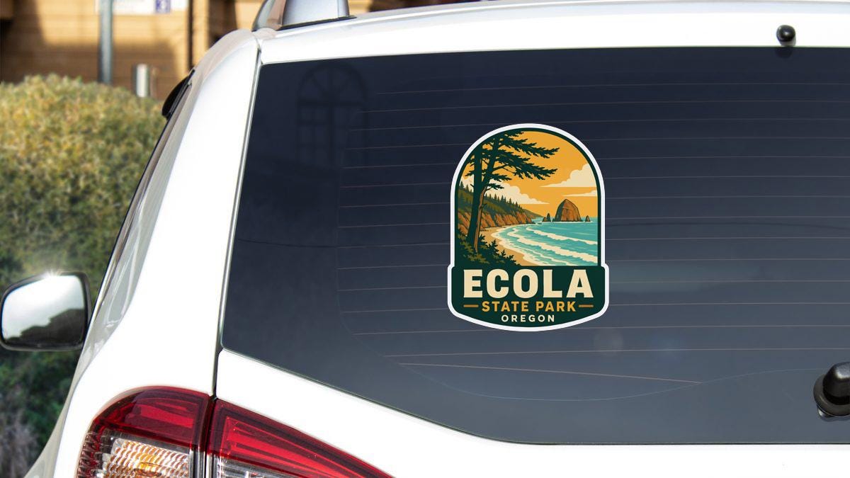 A sticker on the rear window of a white car, depicting a scenic landscape with a beach, mountains, and a sunset.