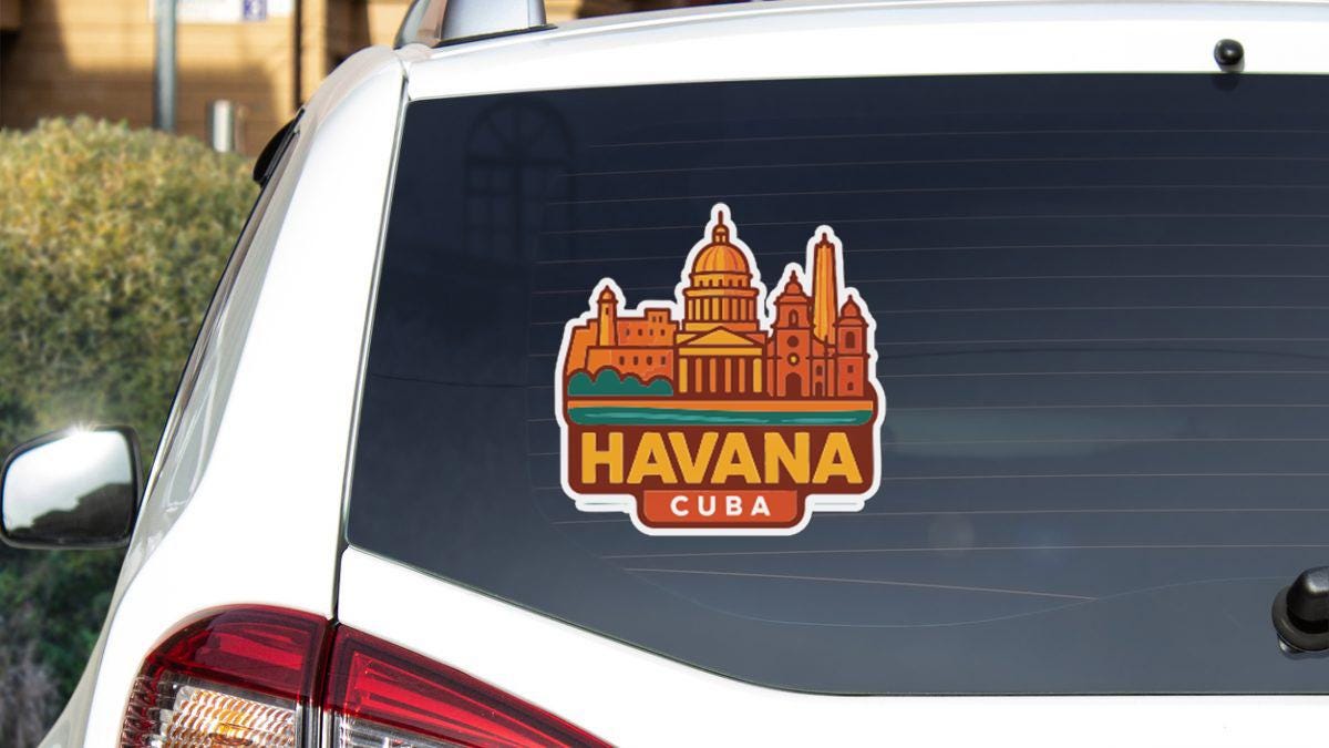A sticker on the rear window of a car that features the image of Havana, Cuba, with the text "HAVANA CUBA" prominently displayed.