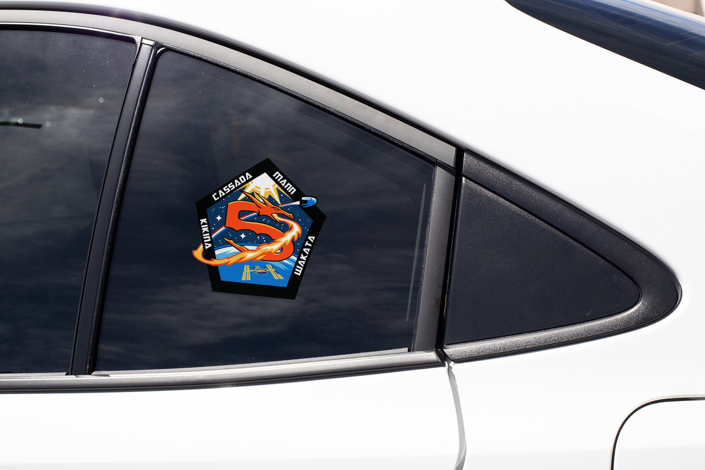 a close up of a car mirror with a sticker on it