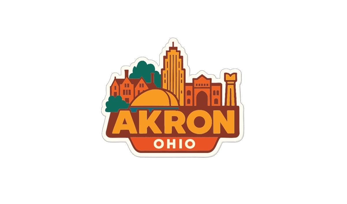 a sticker or logo with the text "AKRON OHIO" prominently displayed.