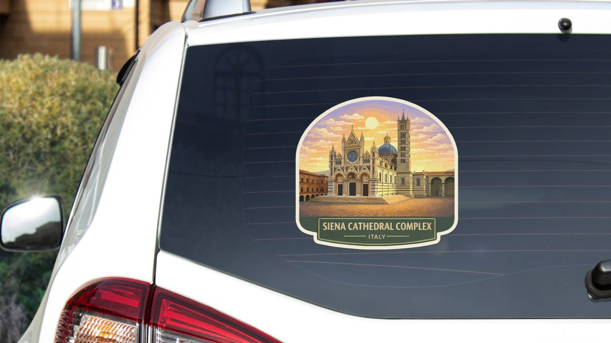 A sticker on the rear window of a car depicting the Siena Cathedral complex in Italy.