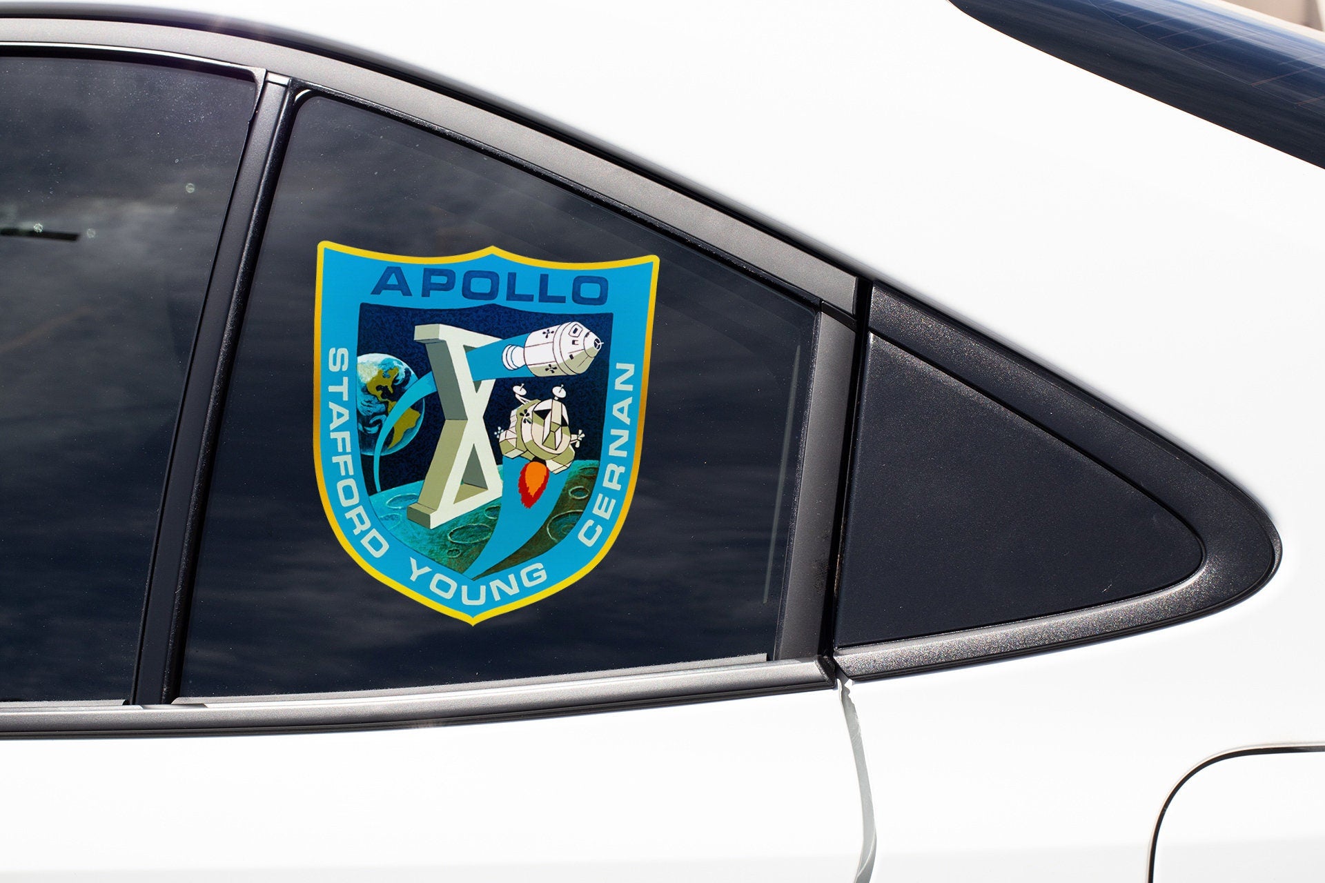 a sticker on the side of a white car