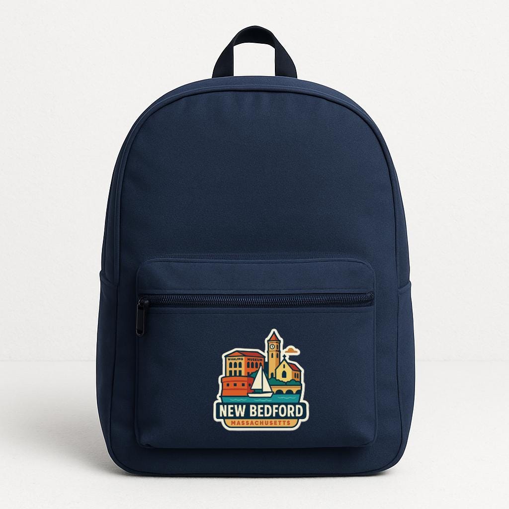 A navy blue backpack with a colorful logo that says "NEW BEDFORD, MASSACHUSETTS" on the front pocket.