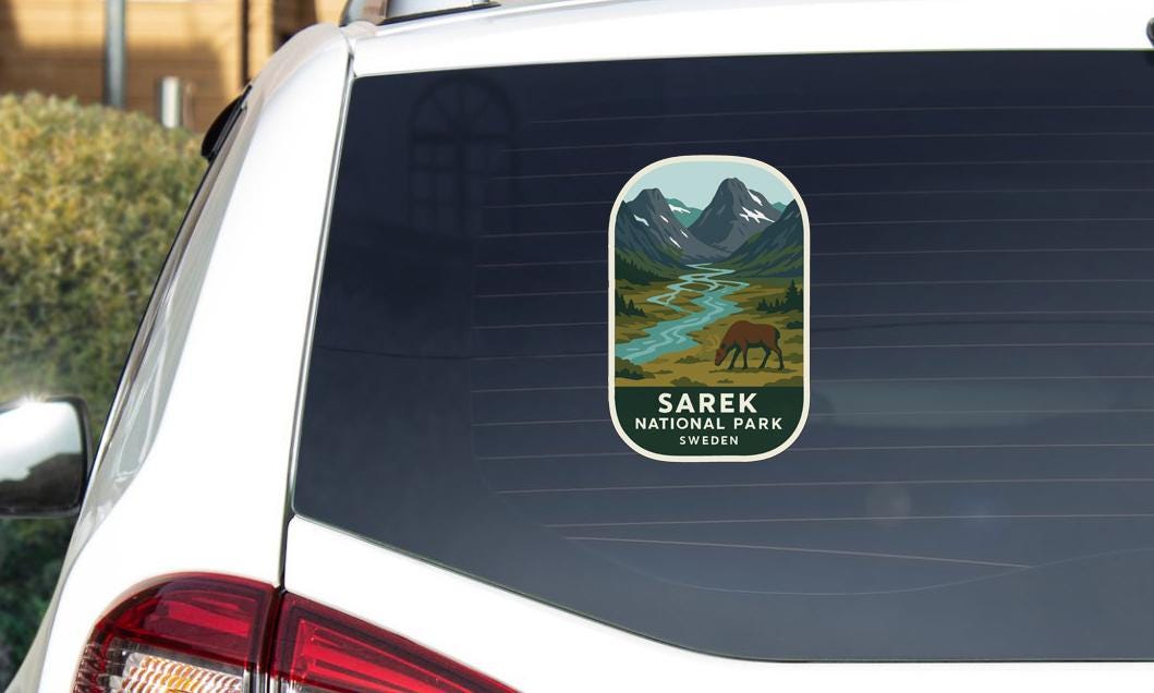 a sticker on the rear window of a car that says "Sarek National Park Sweden".