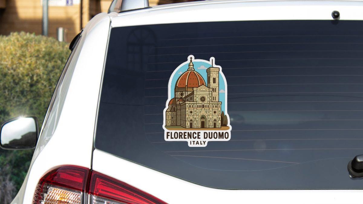 Sticker on rear window of a white car with a picture of Florence Cathedral (Rocco) and the text "FLORENCE DUOMO ITALY".