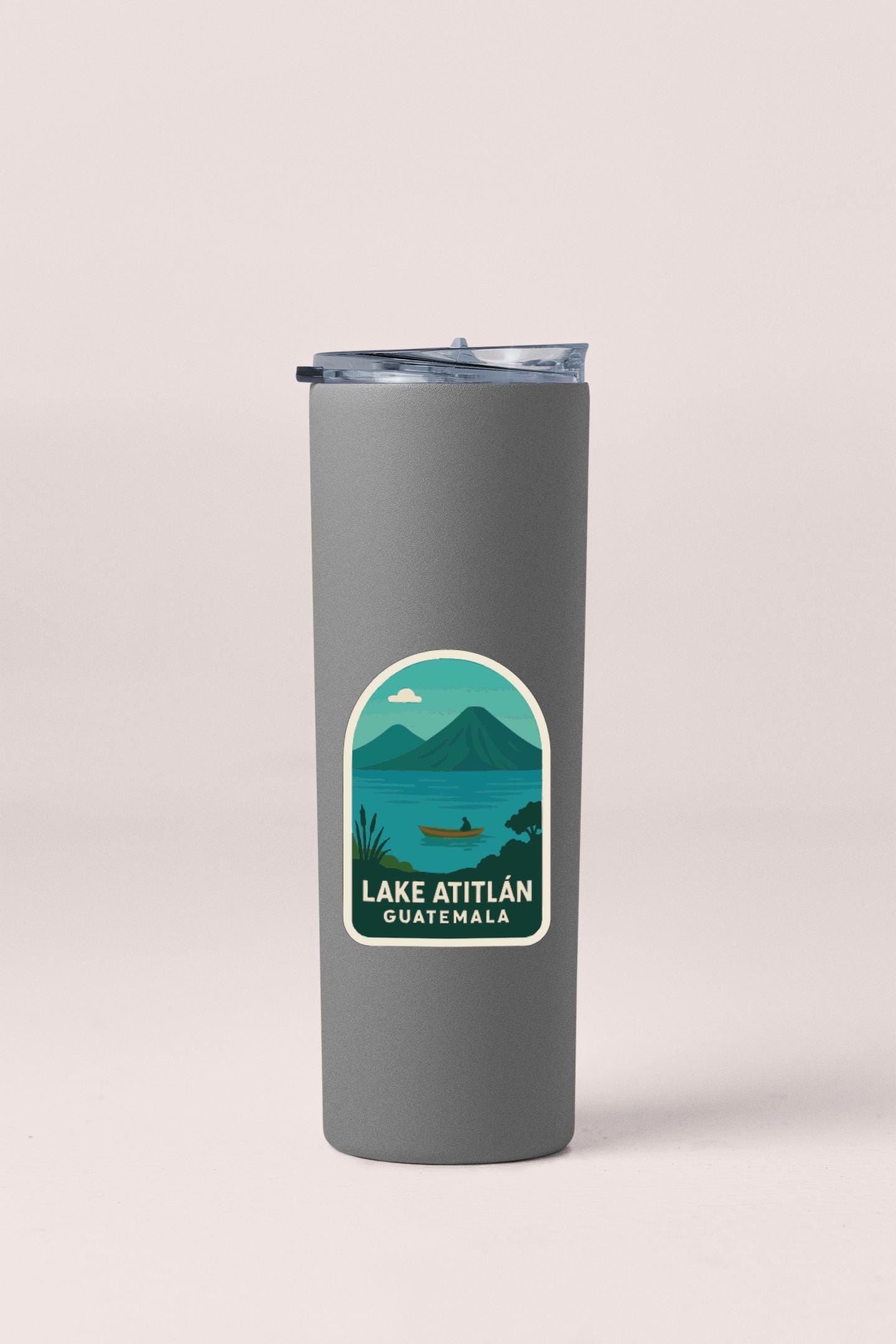 A gray insulated tumbler with a label that says "Lake Atitlan Guatemala".