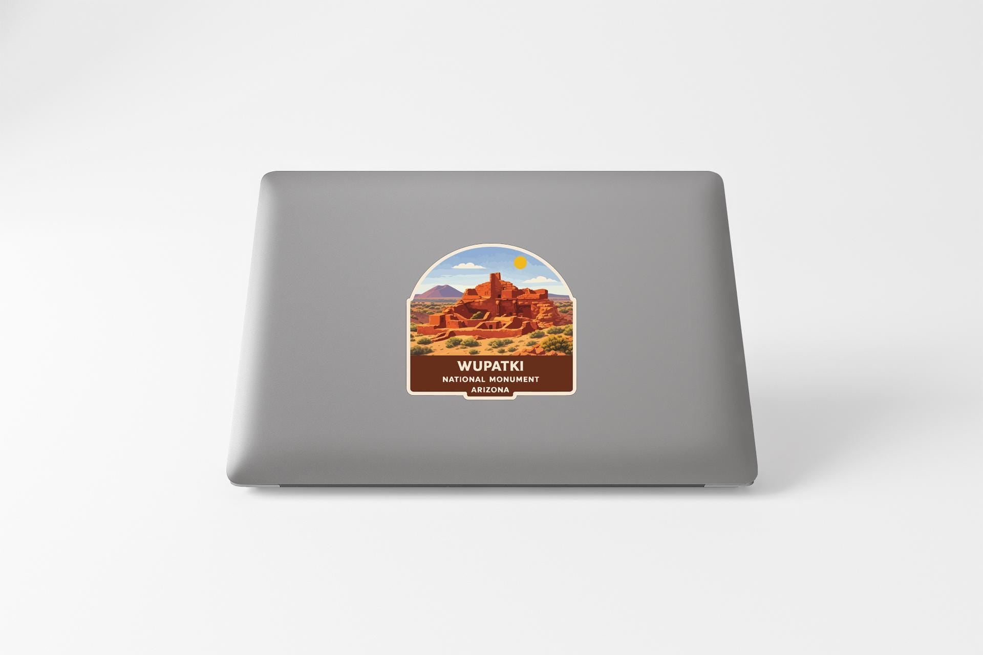 A sticker depicting the Wupati National Monument in Arizona.