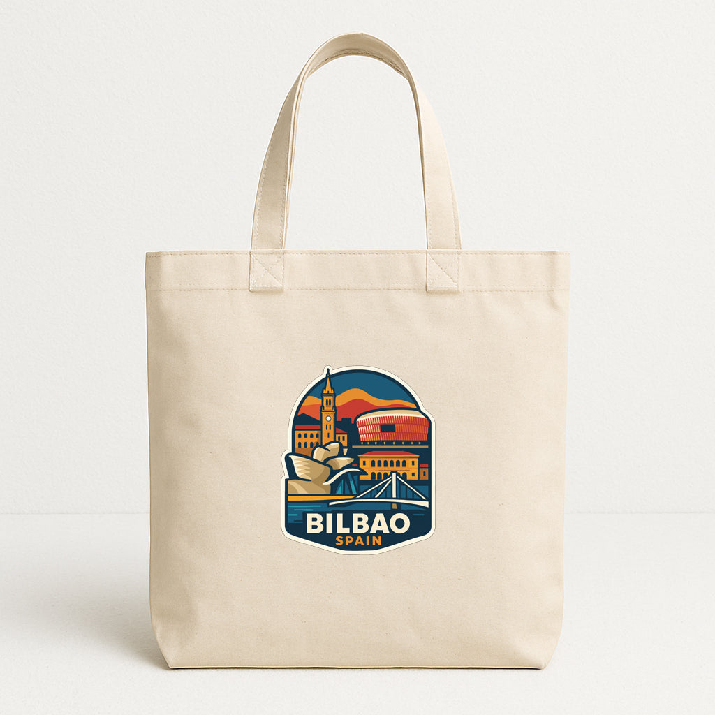 A beige tote bag with a graphic design featuring the city of Bilbao, Spain.