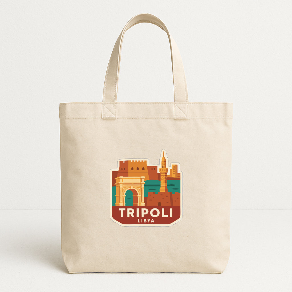 A beige tote bag with a graphic design featuring a city skyline and the text "TRIPOLI LIBYA" printed on it.