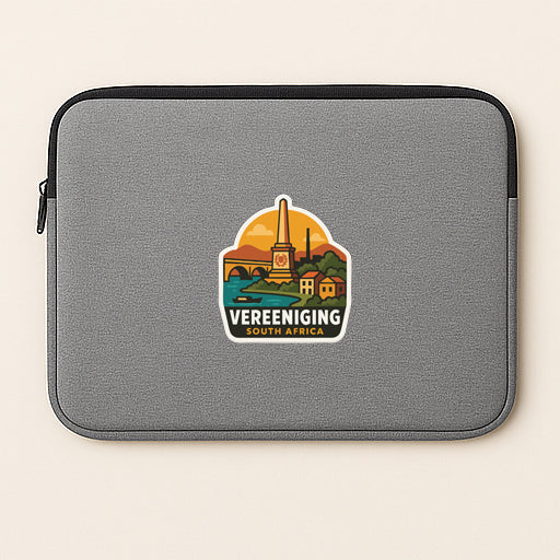 a gray laptop sleeve with a sticker depicting a scenic view of Vereeniging, South Africa.