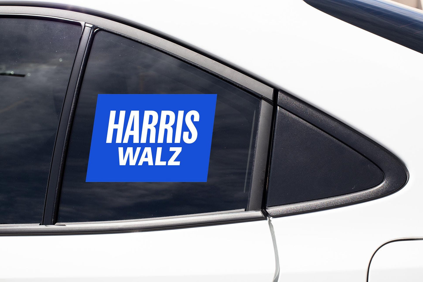 a blue sticker on the side of a white car