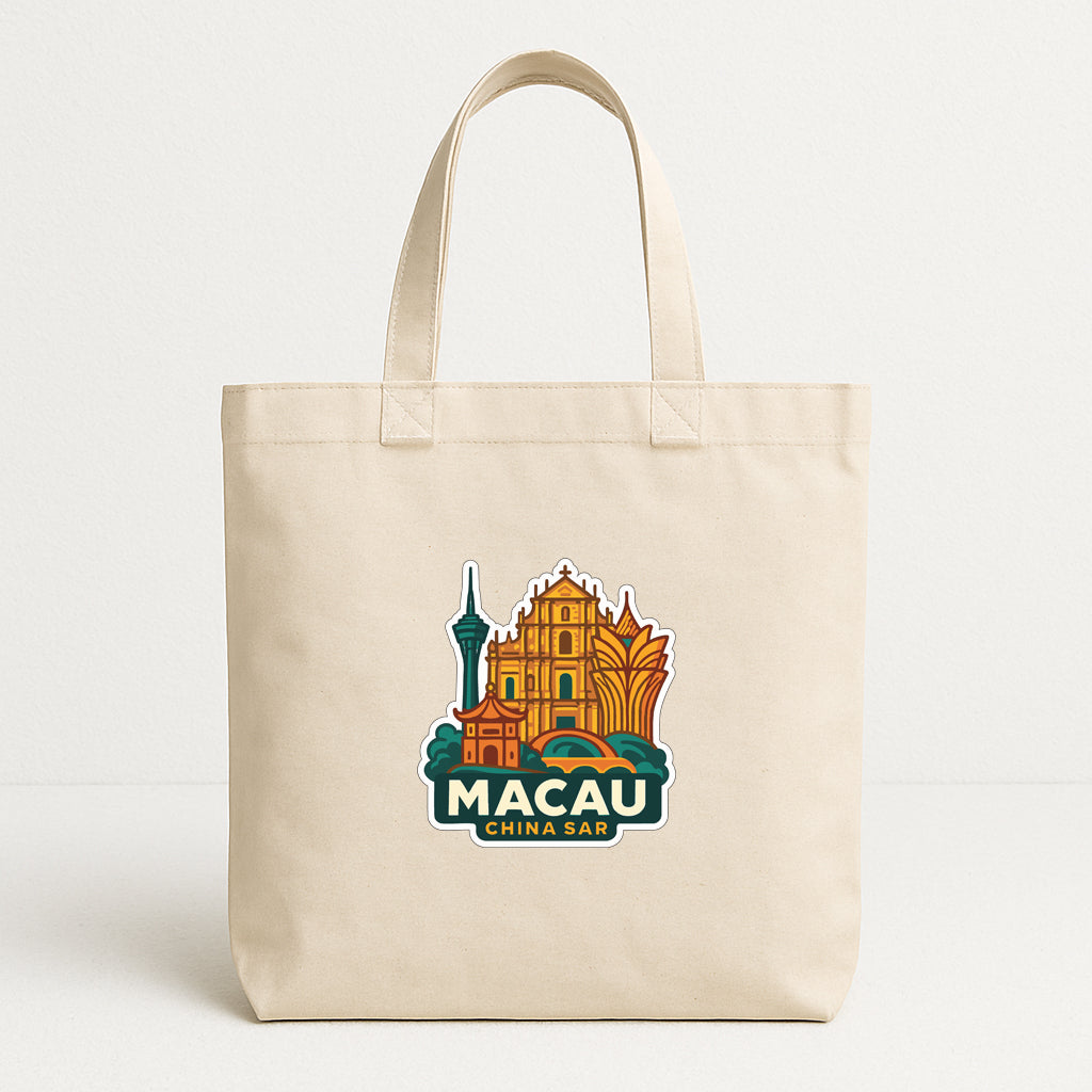 A beige tote bag with a graphic design featuring a city skyline and the text "MACAU CHINA BAR".