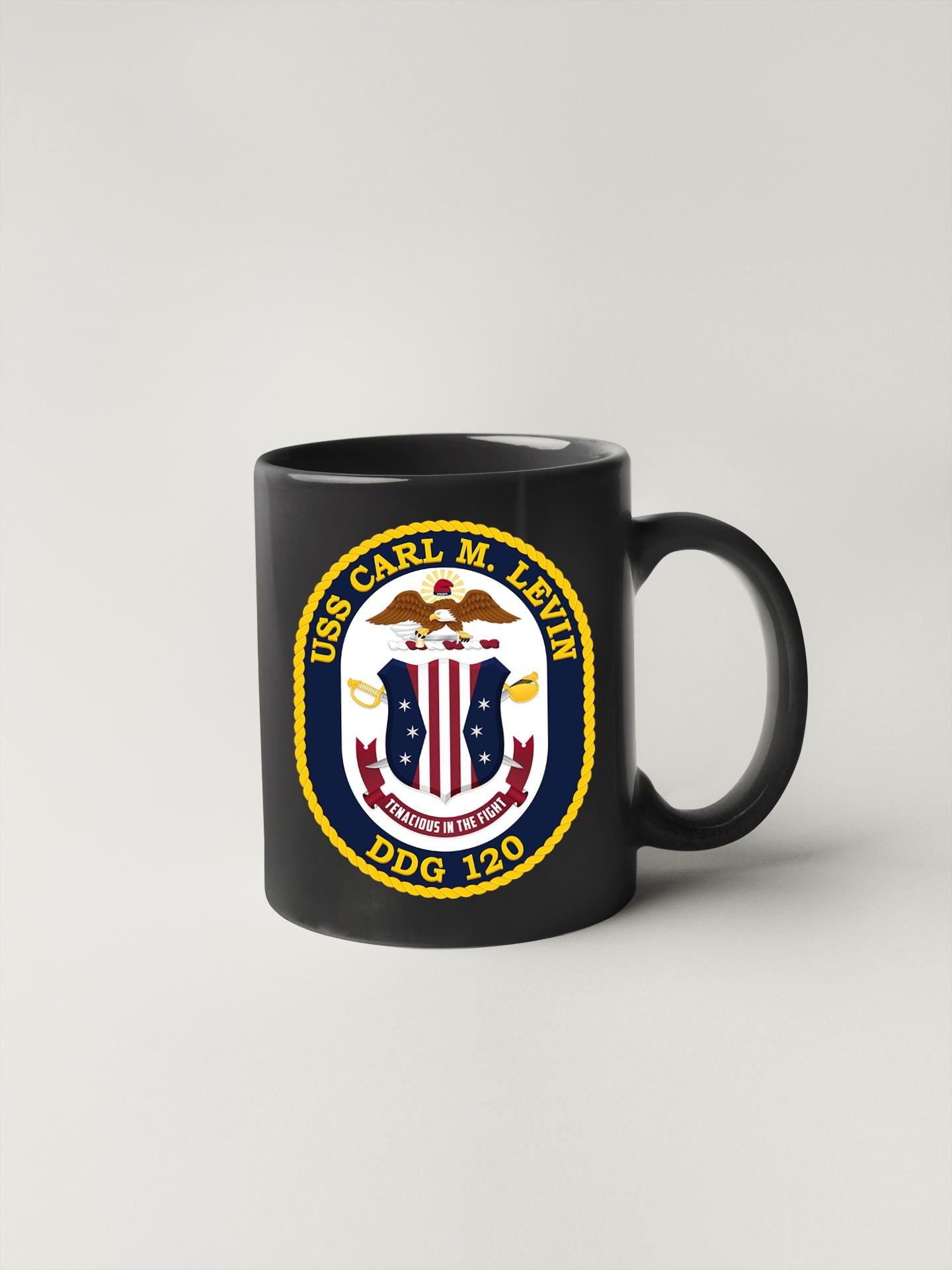 a black coffee mug with the seal of the united states of america