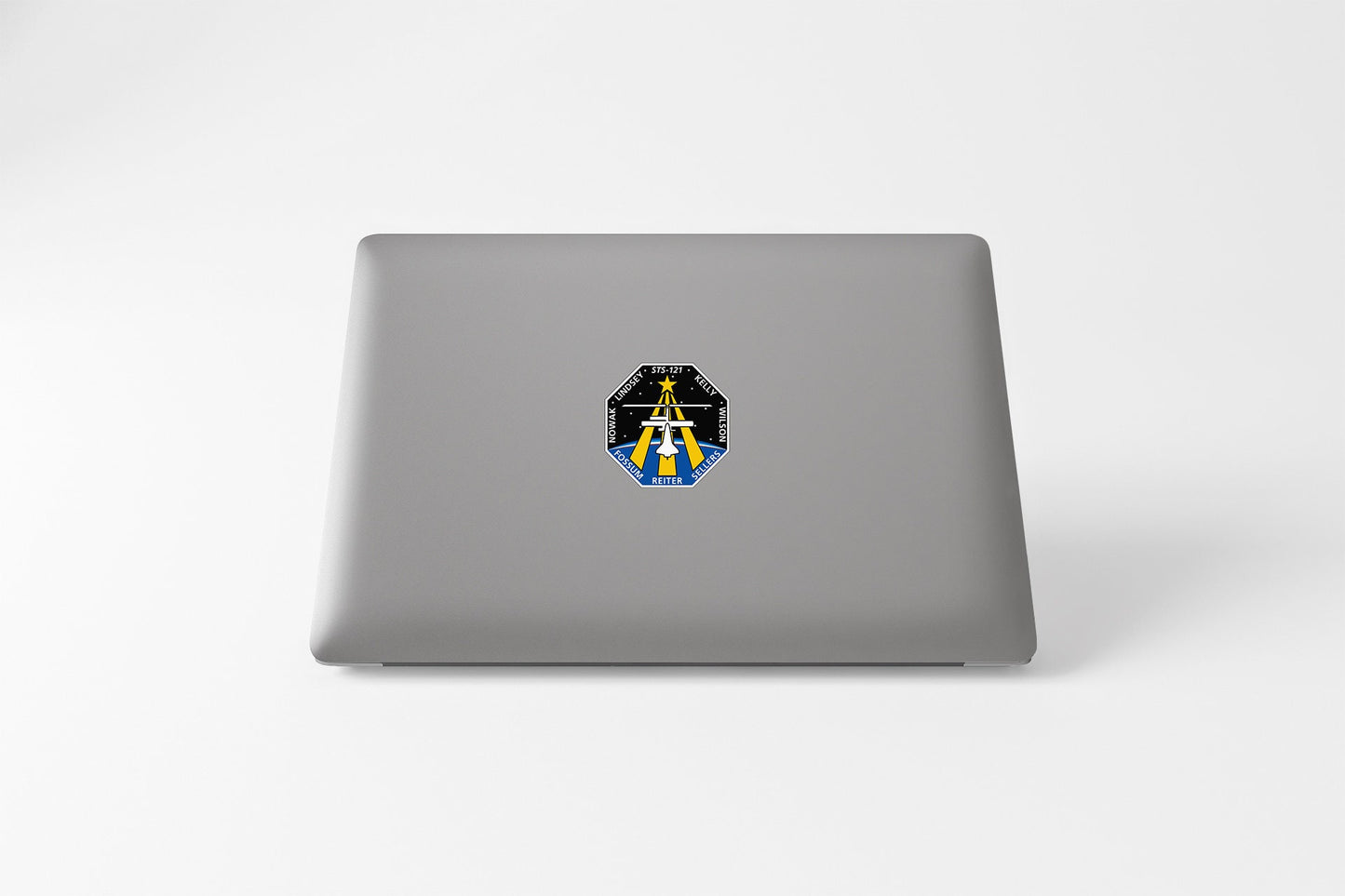 a laptop that has a picture of a person on it