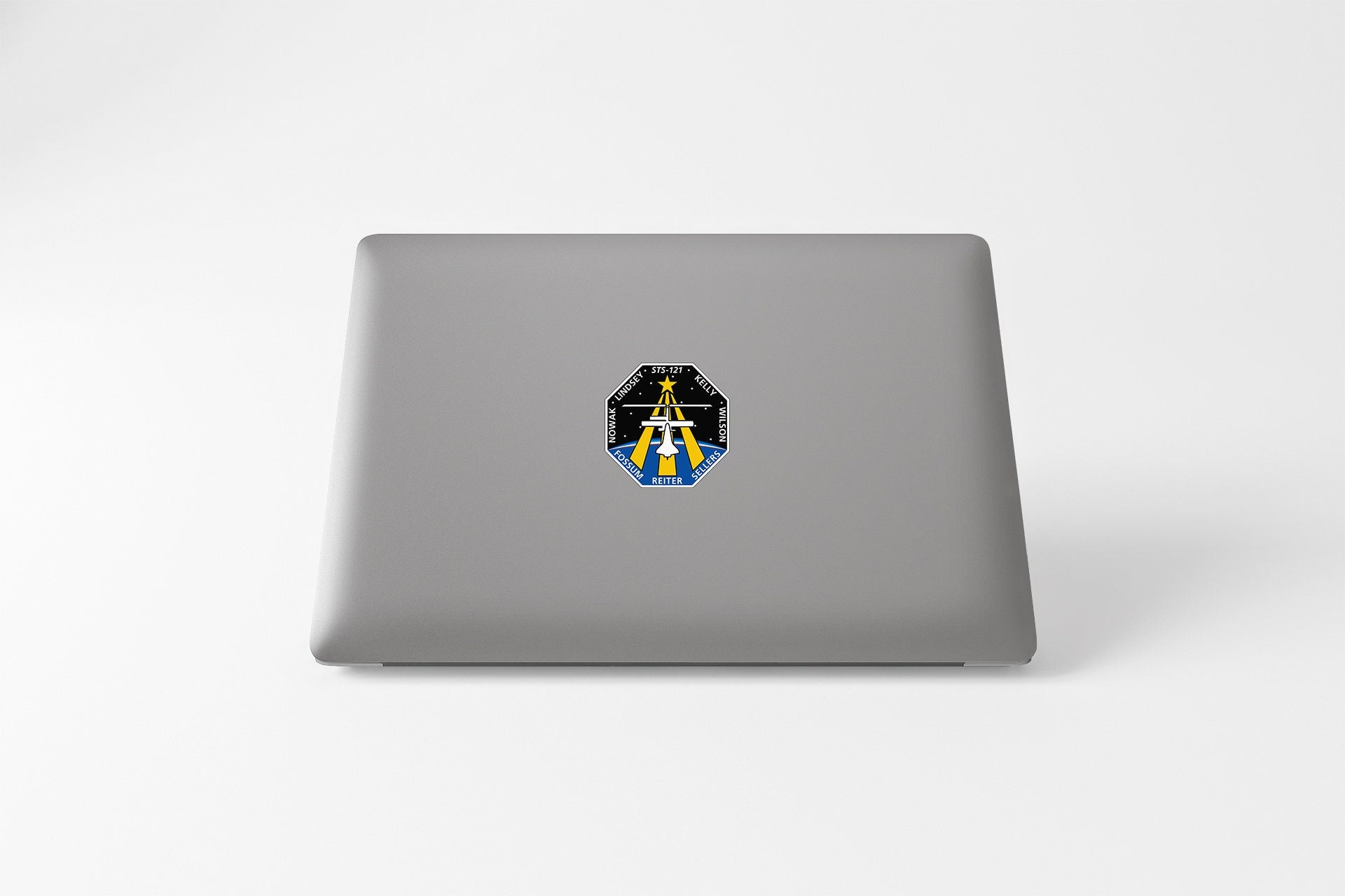 a laptop that has a picture of a person on it