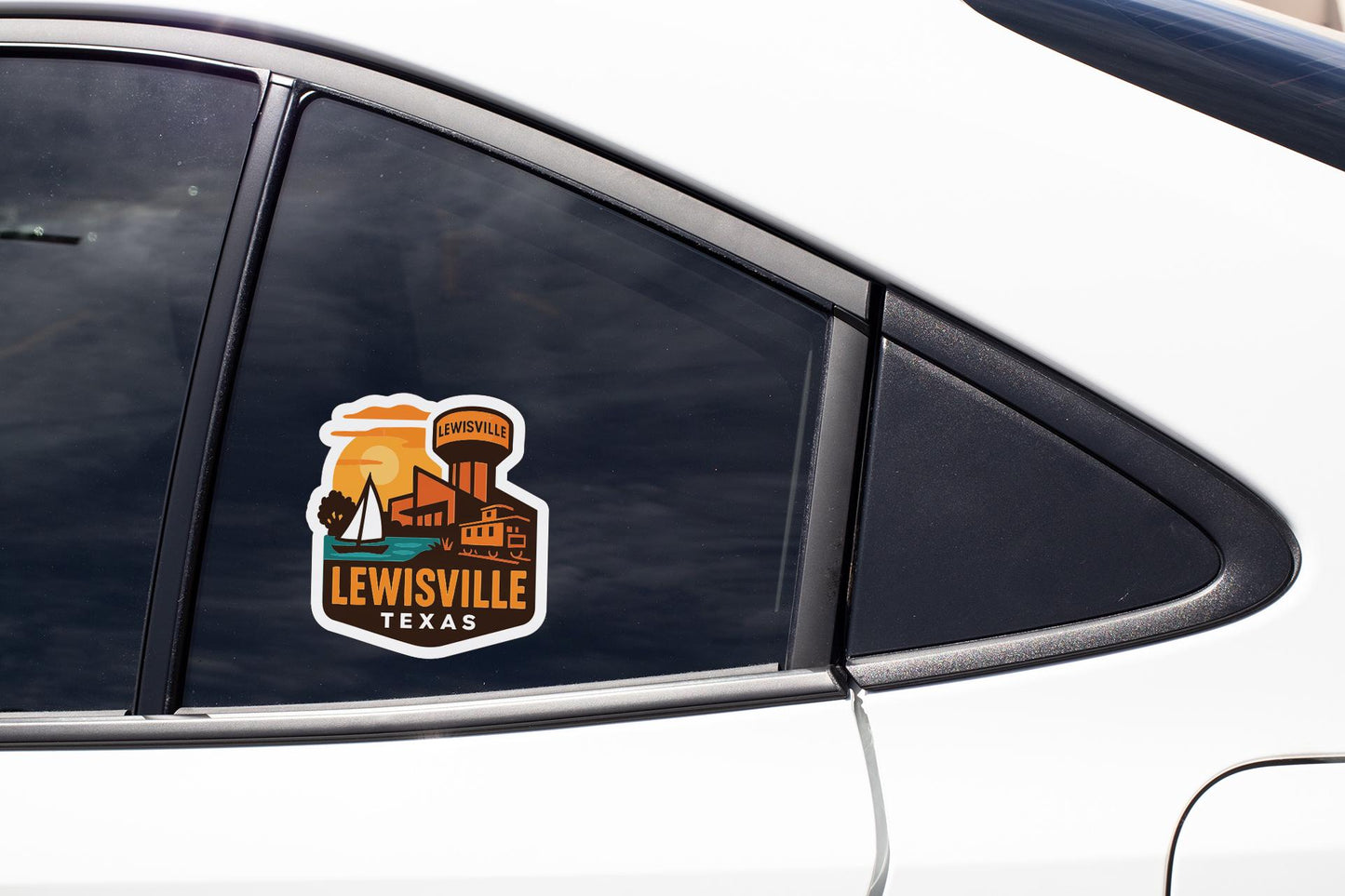 A car window sticker with a graphic of a city and the text "LEWISVILLE TEXAS" printed on it.