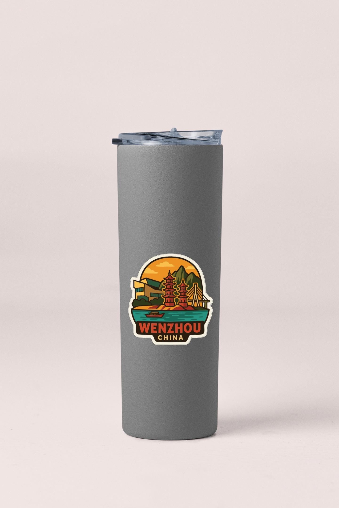 A gray insulated tumbler with a sticker depicting a scenic view of Wenzhou, China.