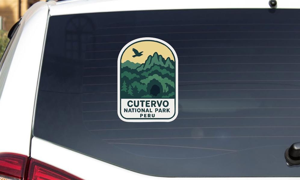 a sticker on the rear window of a vehicle, displaying the logo and name of the Cutervo National Park in Peru.