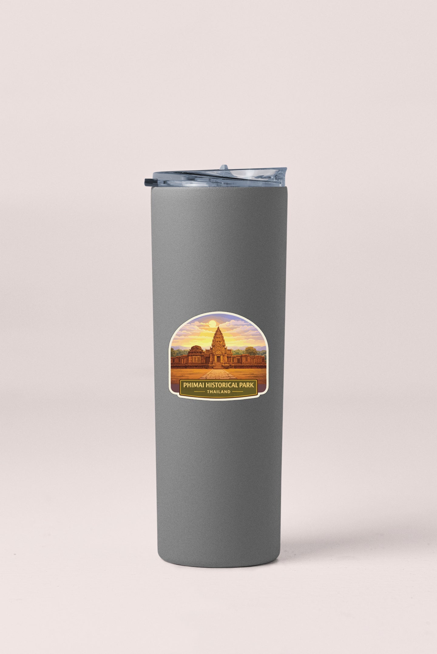 A gray insulated tumbler with a label that reads "PHIMAI HISTORICAL PARK THAILAND" and features an illustration of a historical building.