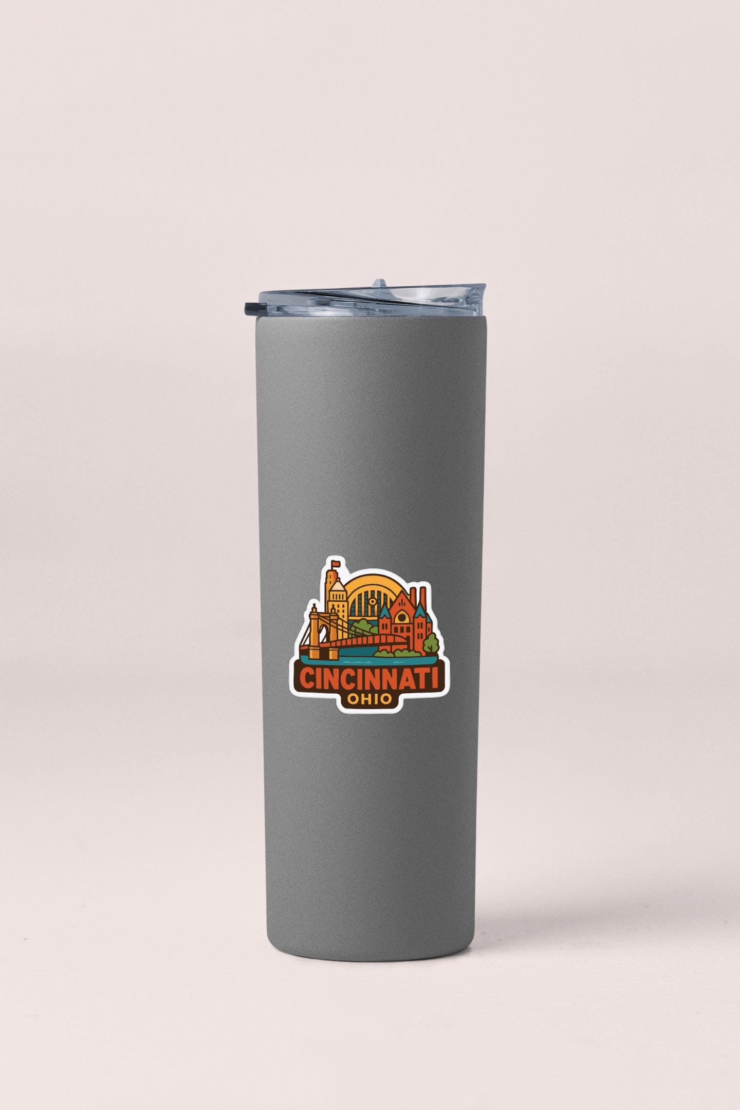 A gray insulated tumbler with a printed logo of Cincinnati, Ohio.