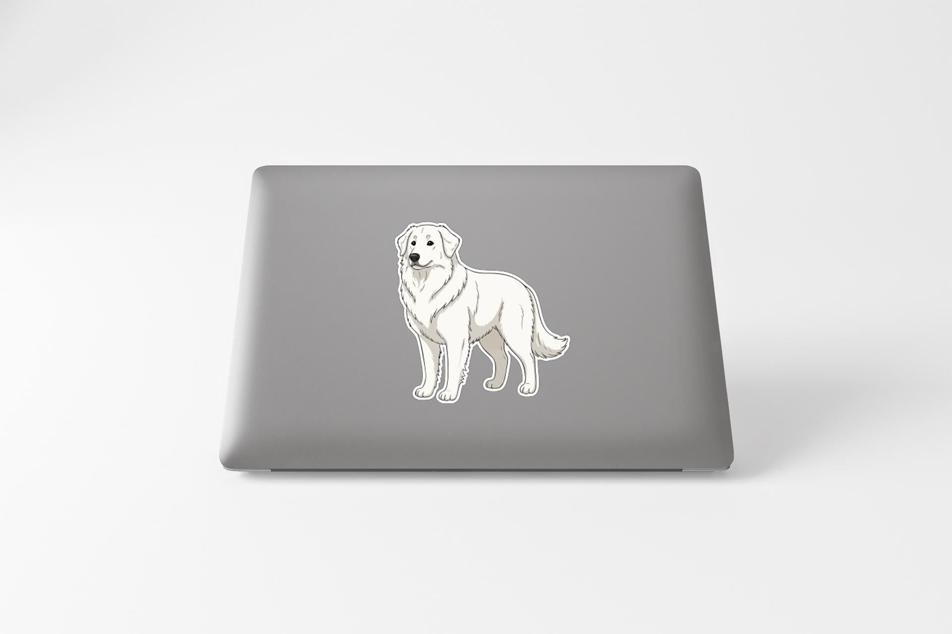 A sticker of a dog is on the back of a laptop.