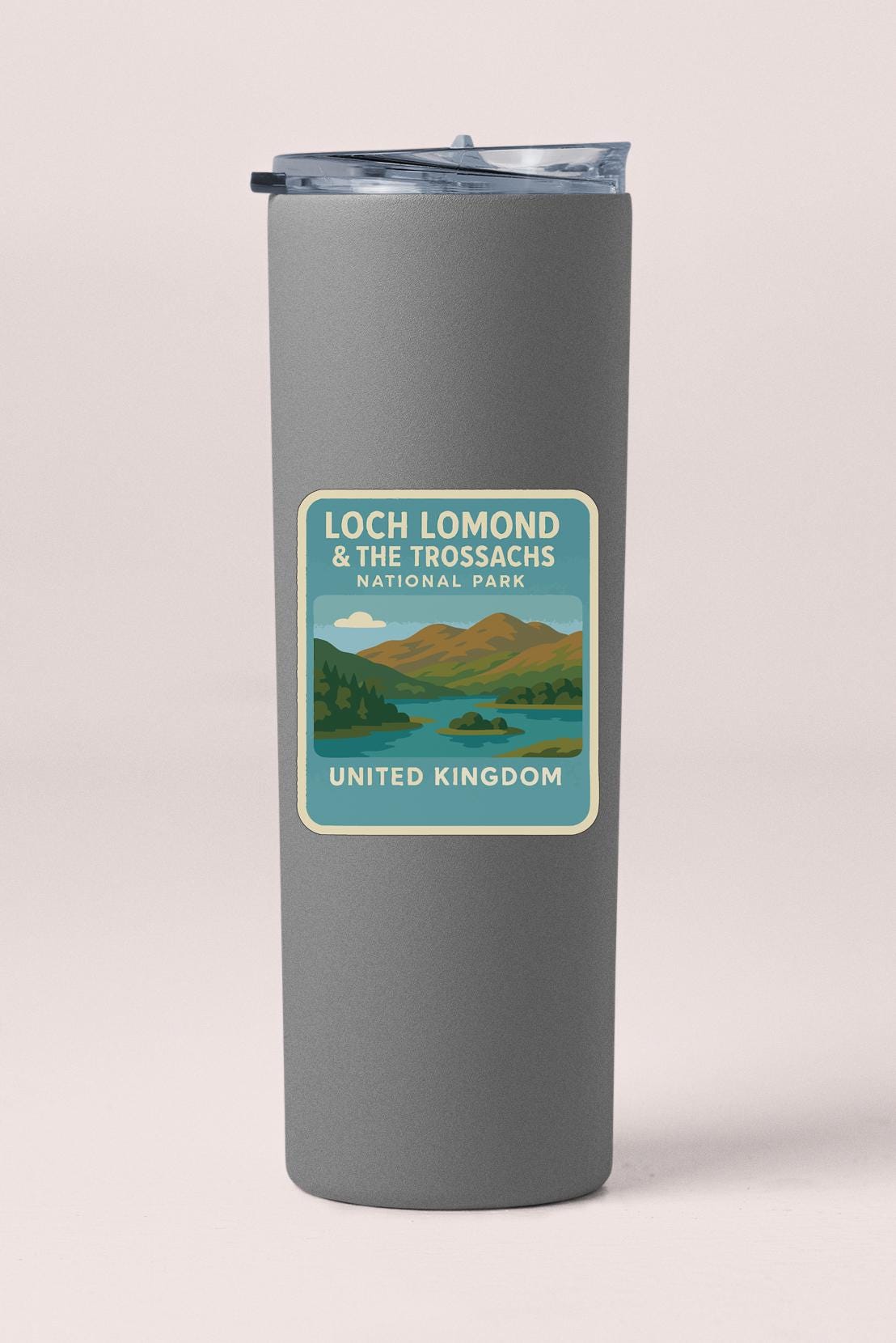 A gray insulated tumbler with a label that says "Loch Lomond & the Trossachs National Park United Kingdom".
