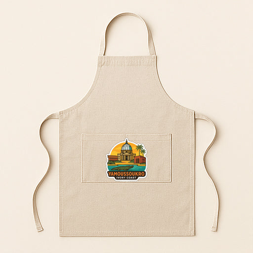 A beige apricot with a graphic design on the front pocket, featuring a building and palm trees.