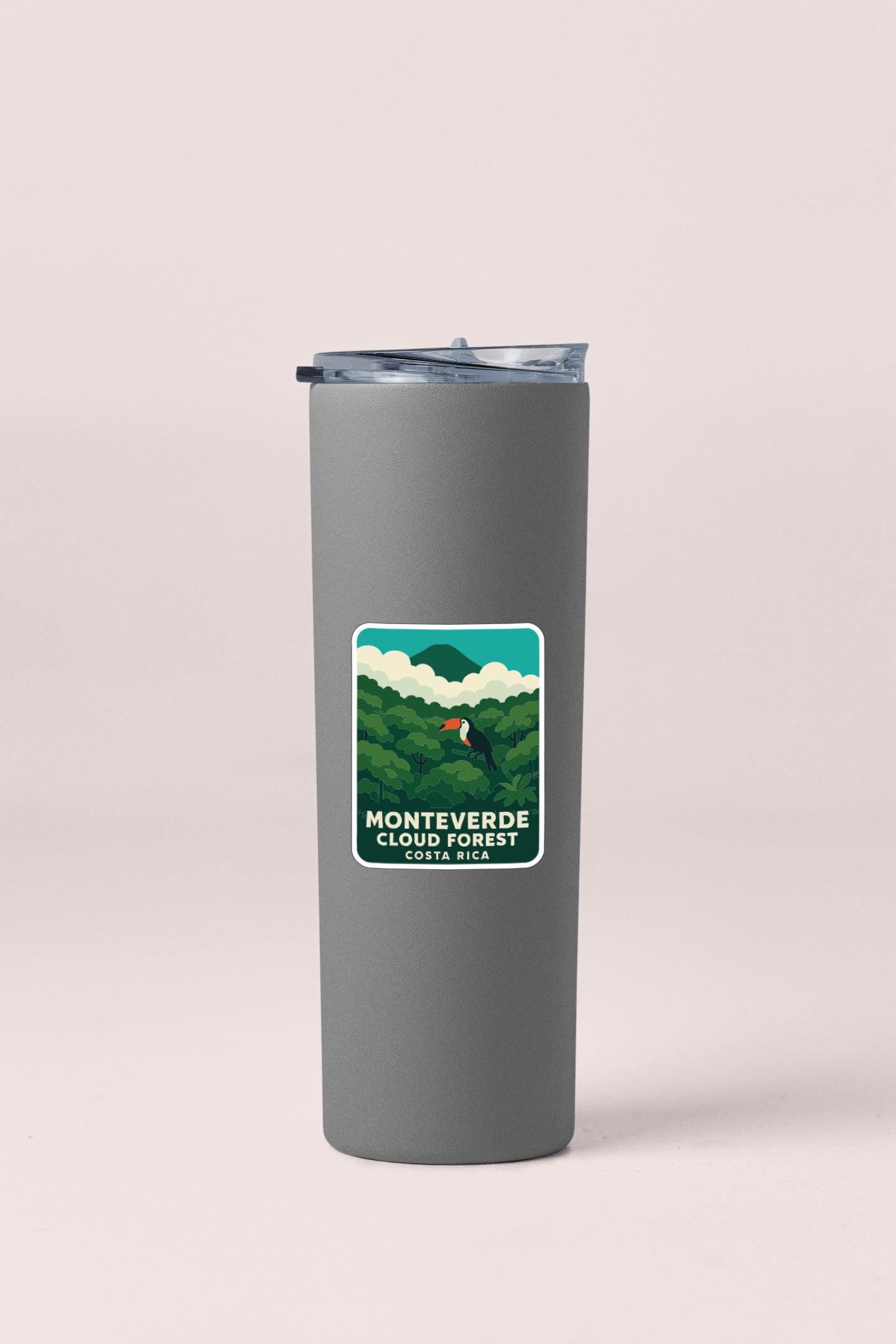 A gray insulated tumbler with a label that says "MONTEVERDE CLOUDE RICOT" and "COSTA RICA".