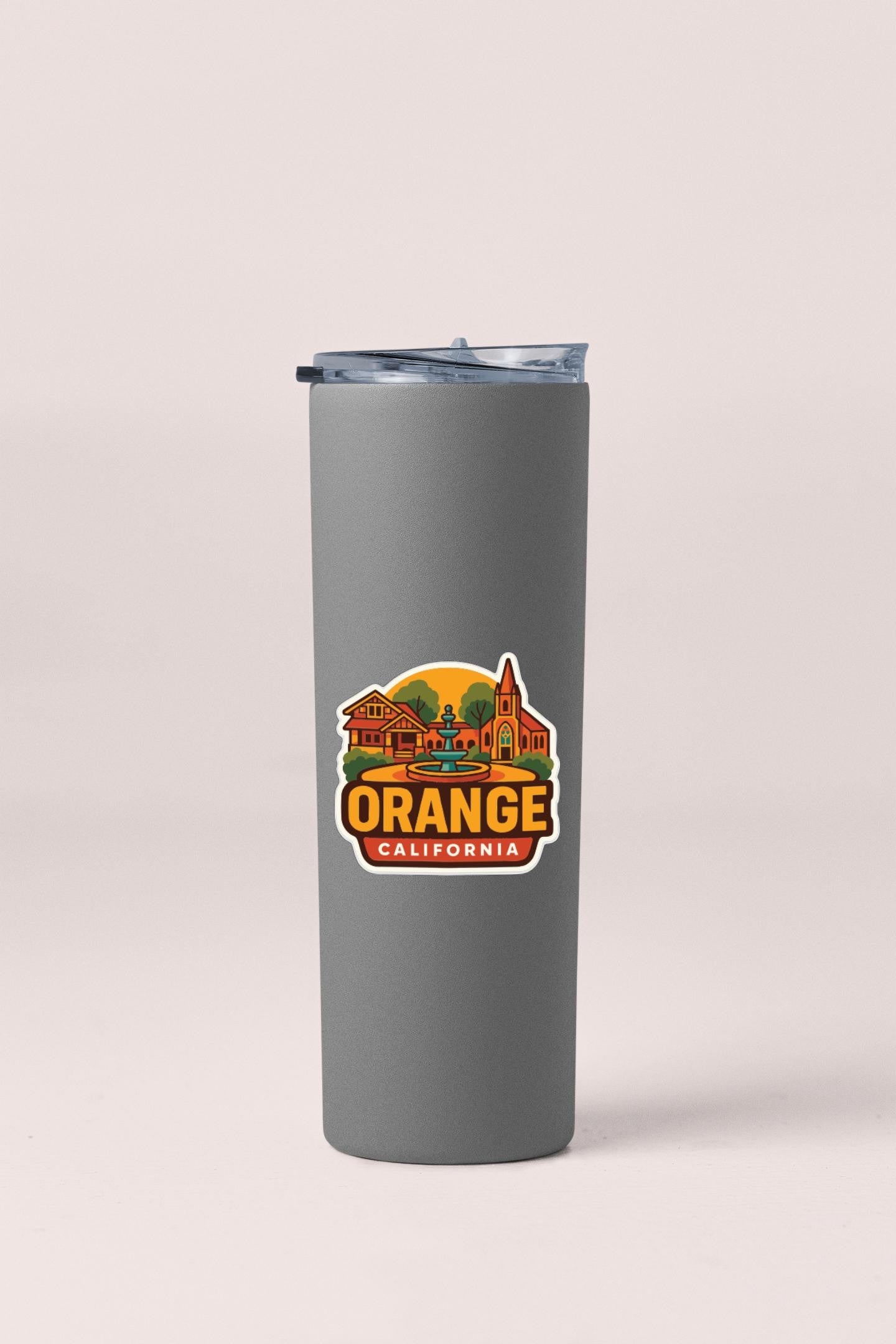 A gray insulated tumbler with a printed label that says "Orange California".