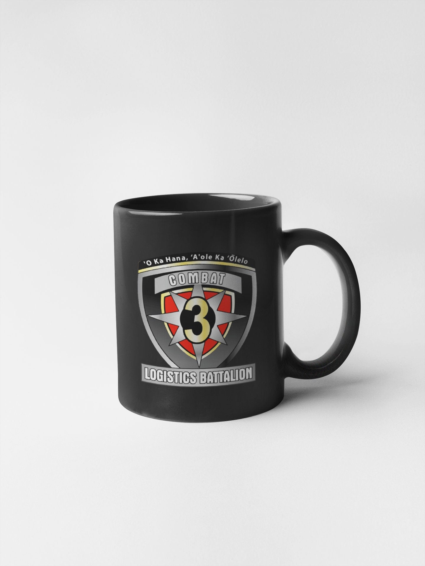a black mug with the number three on it
