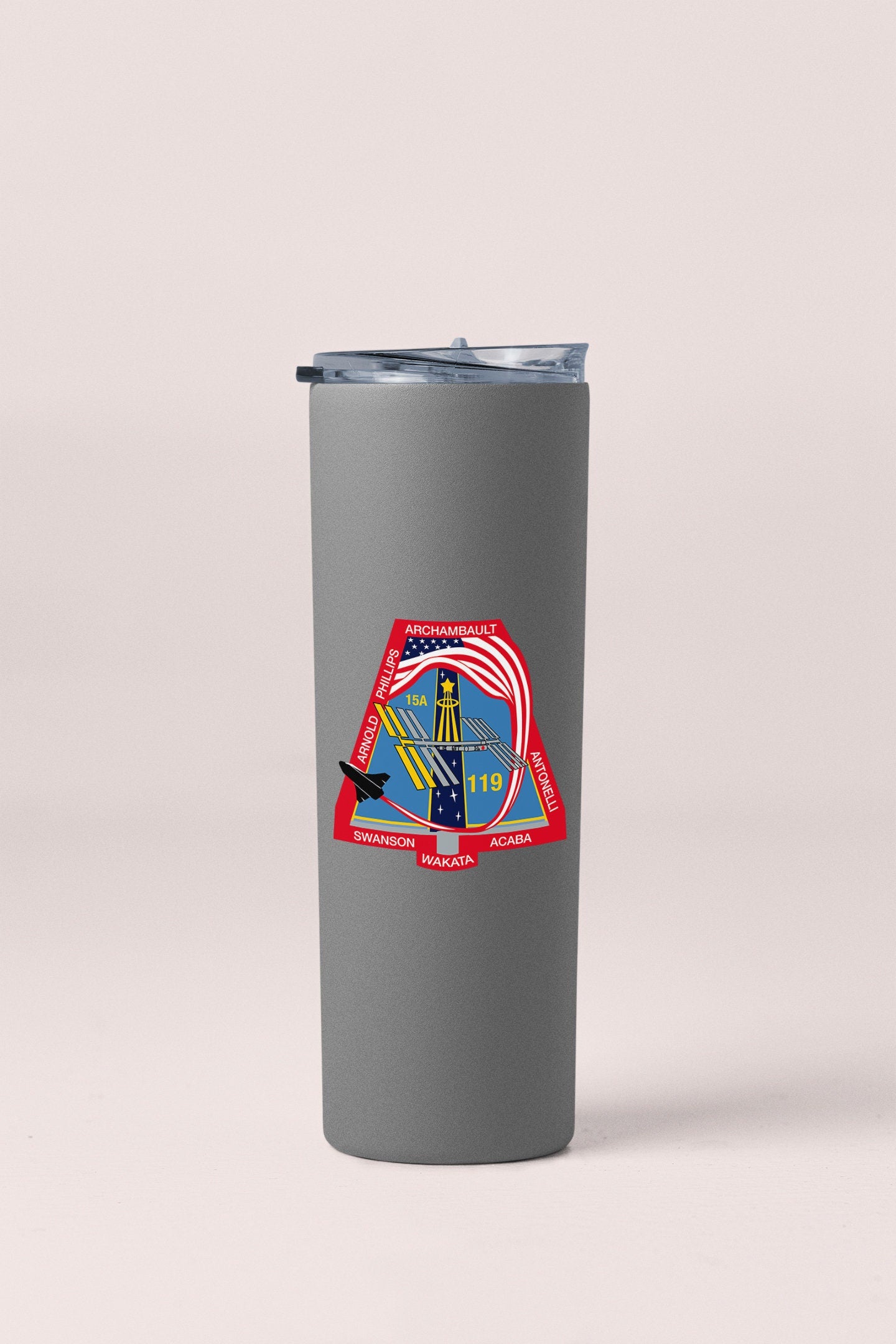a stainless steel tumbler cup with a picture of a lighthouse