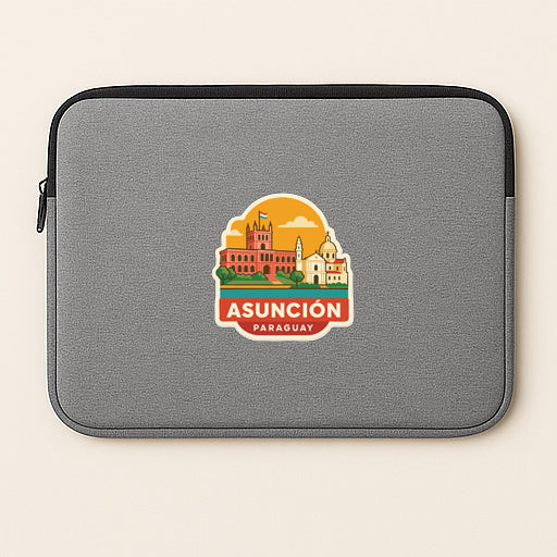 a gray laptop sleeve with a colorful sticker depicting a cityscape and the text "Asuncion Paraguay".