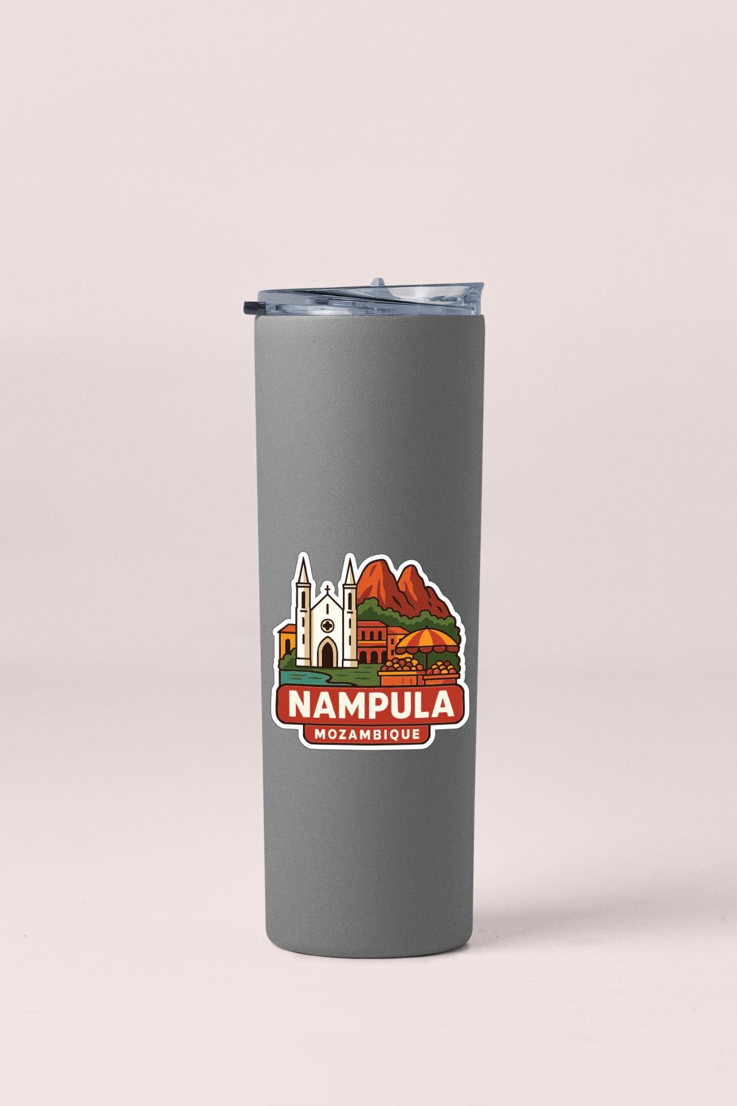 A gray tumbler with a printed label that says "NAMPULA MOSAMBIQE" on it.