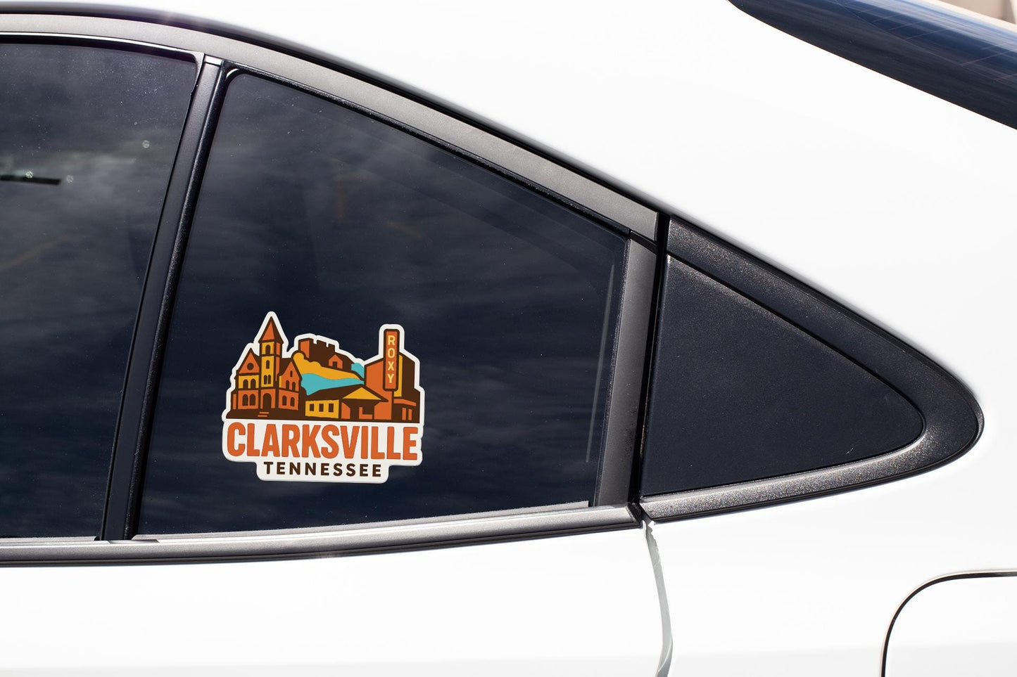 A sticker on the side of a car window that says "CLARKSVILLE TENNESSEE".