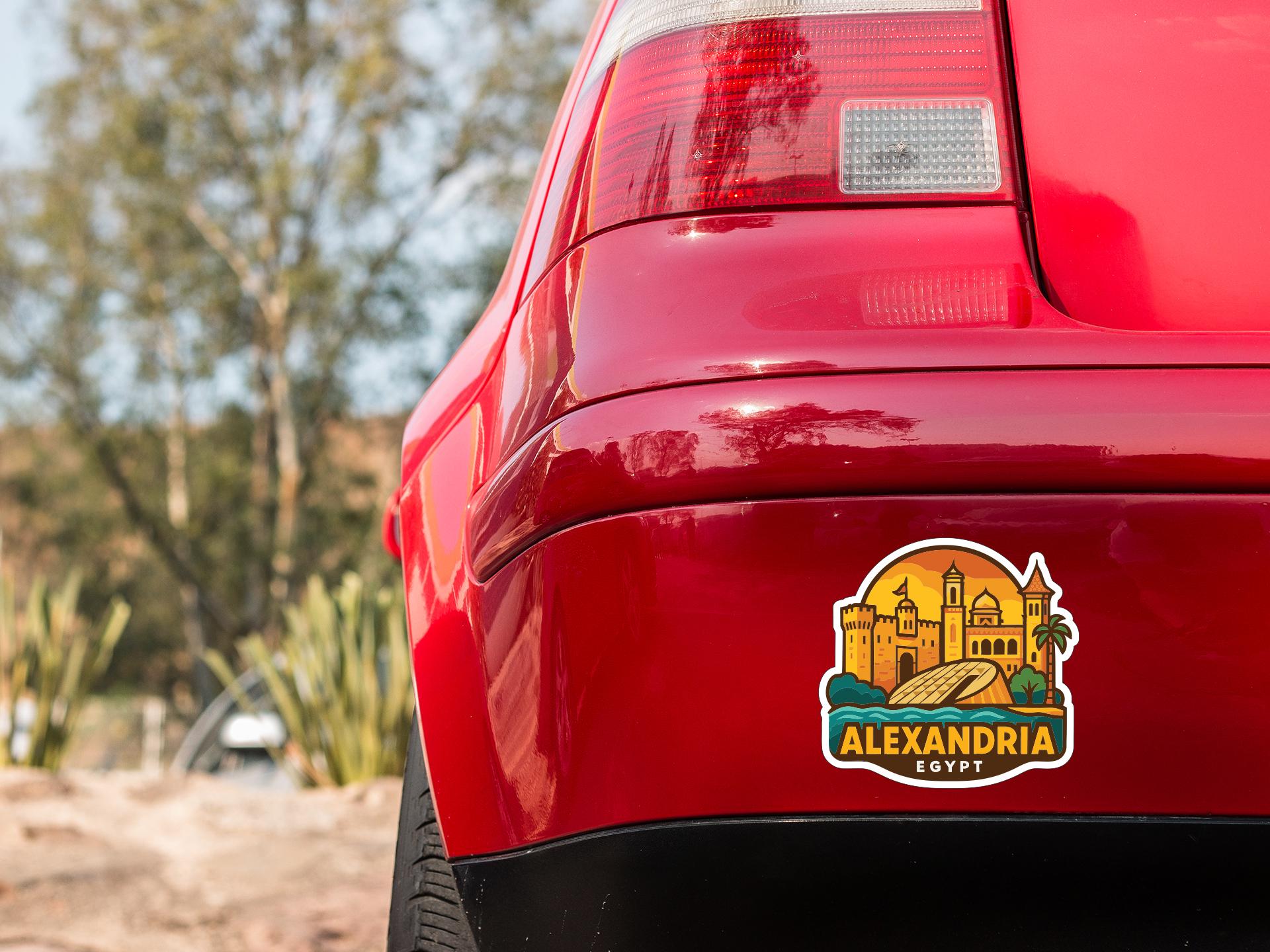 the rear end of a red car with a sticker on the trunk that says " ALEXANDRIA EGYPT".