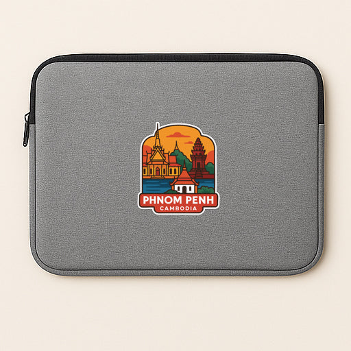 a gray laptop sleeve with a colorful graphic of a cityscape and the text "Phnom Penh Cambodia" printed on it.