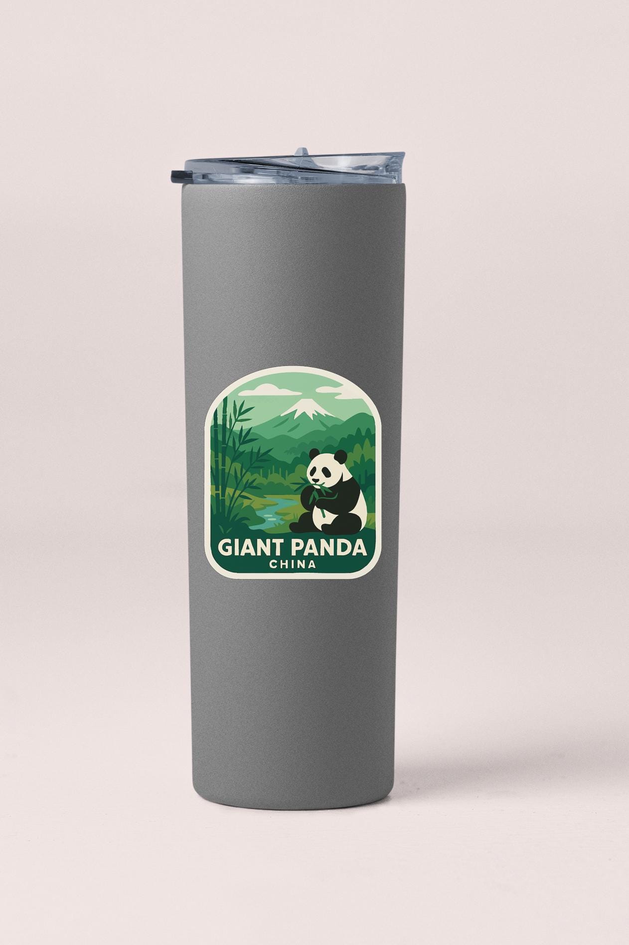 A gray insulated tumbler with a label featuring a panda bear and the text "Giant Panda China".