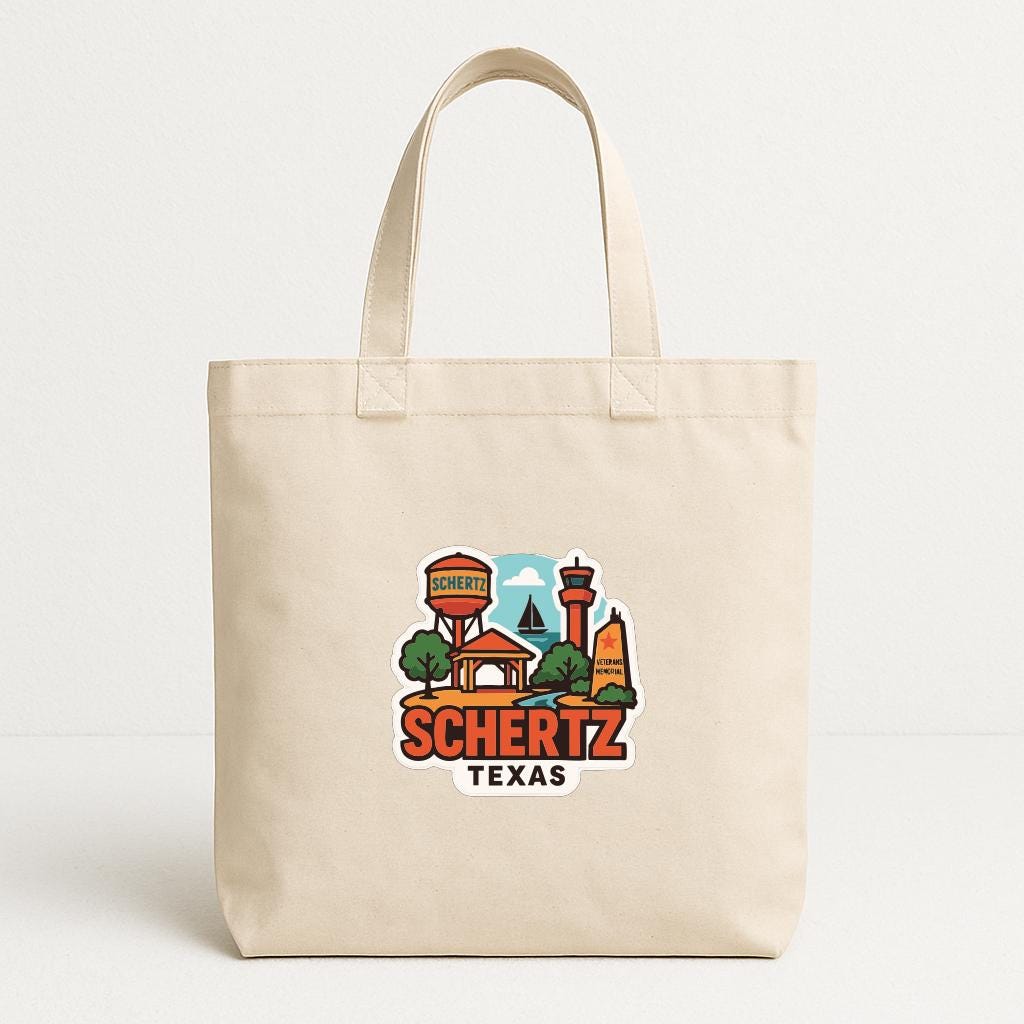 A beige tote bag with a colorful graphic design featuring landmarks and text related to the city of Schertz, Texas.
