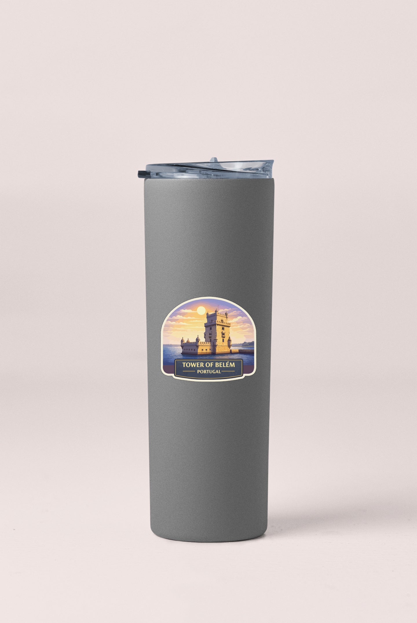 A gray tumbler with a label that says "TOWER OF BELLEM PORTUGAL" on it.