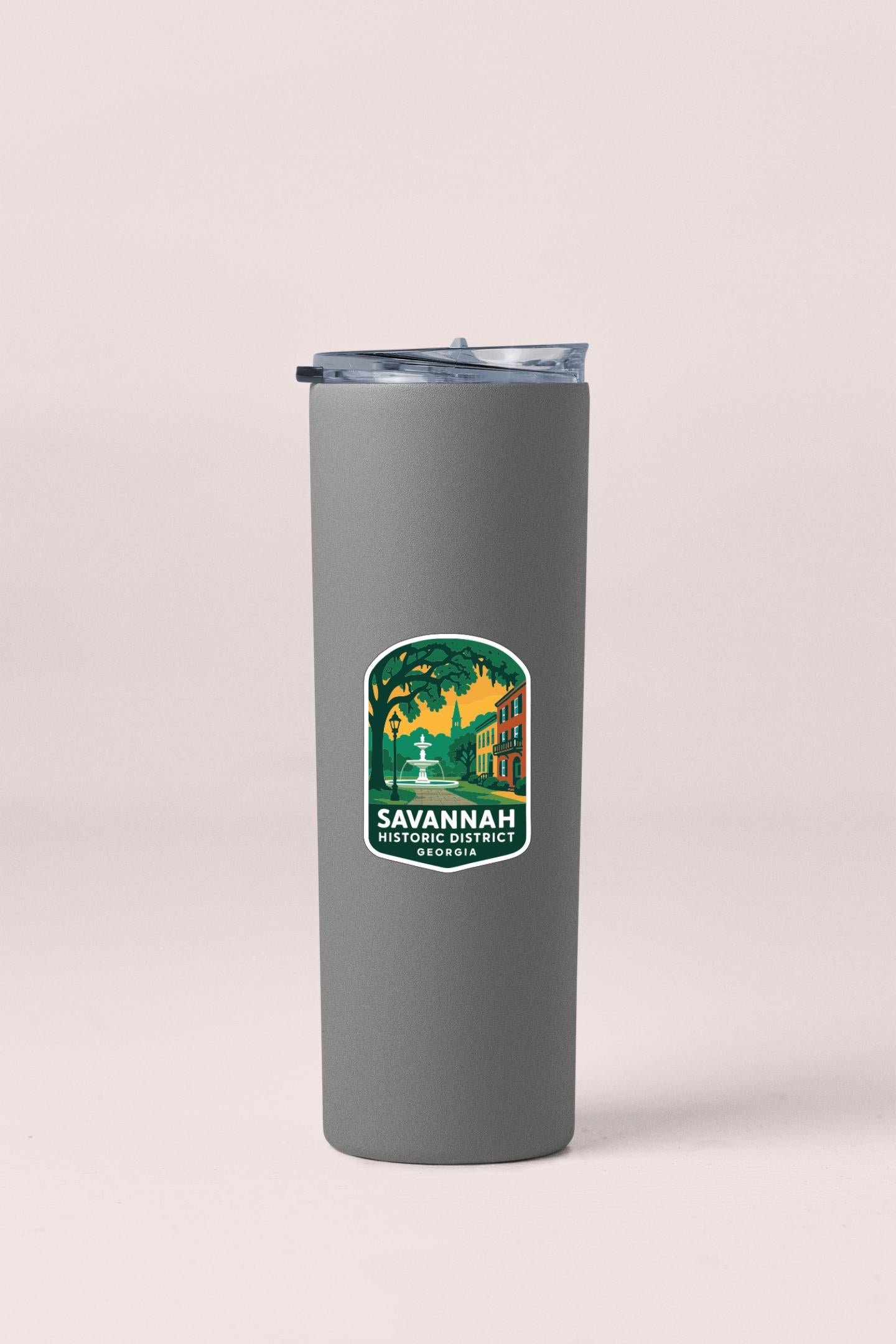 A gray insulated tumbler with a label that says "SAVANNAH HISTORIC HOMECOMING GEORGIA".