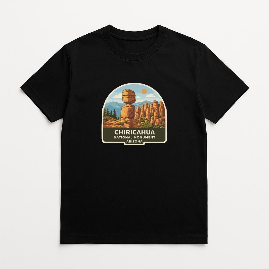 A black t-shirt with a graphic design depicting the Chiricahua National Monument in Arizona.