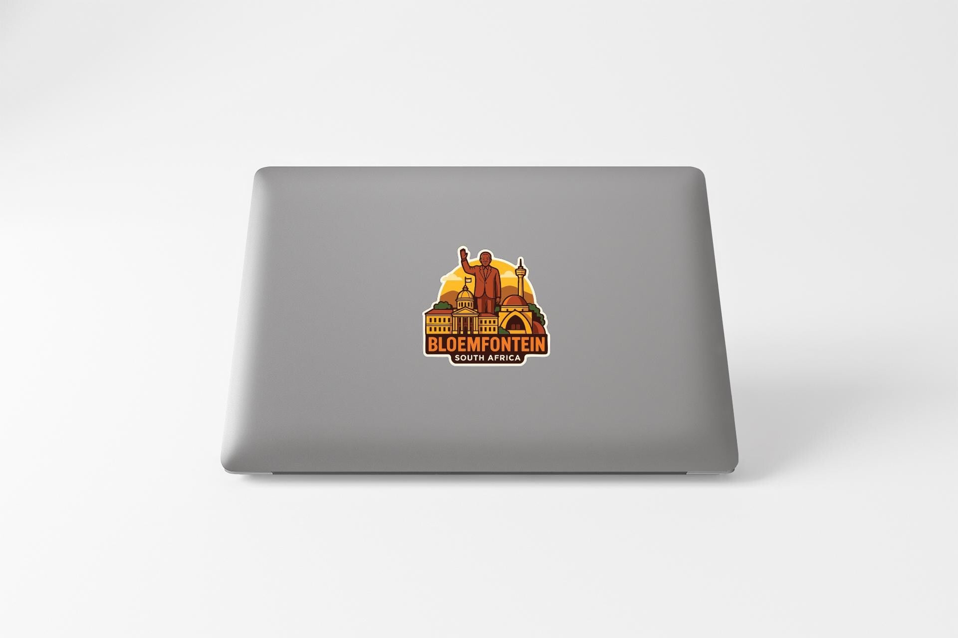 a sticker on the back of a laptop that says "BLOEMFONTEIN SOUTH AFRICA".