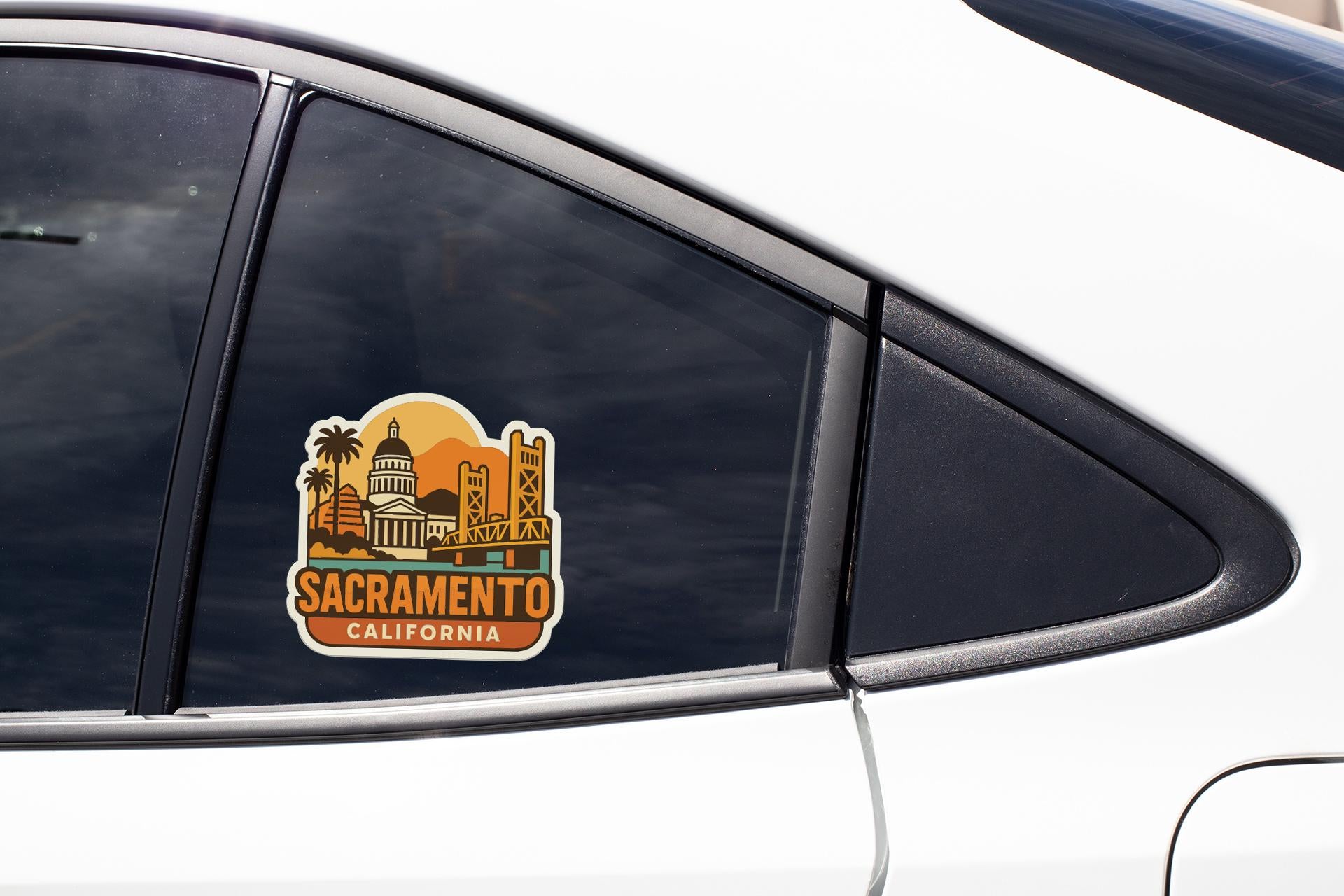 A sticker on the side of a car window, depicting the Sacramento, California skyline.