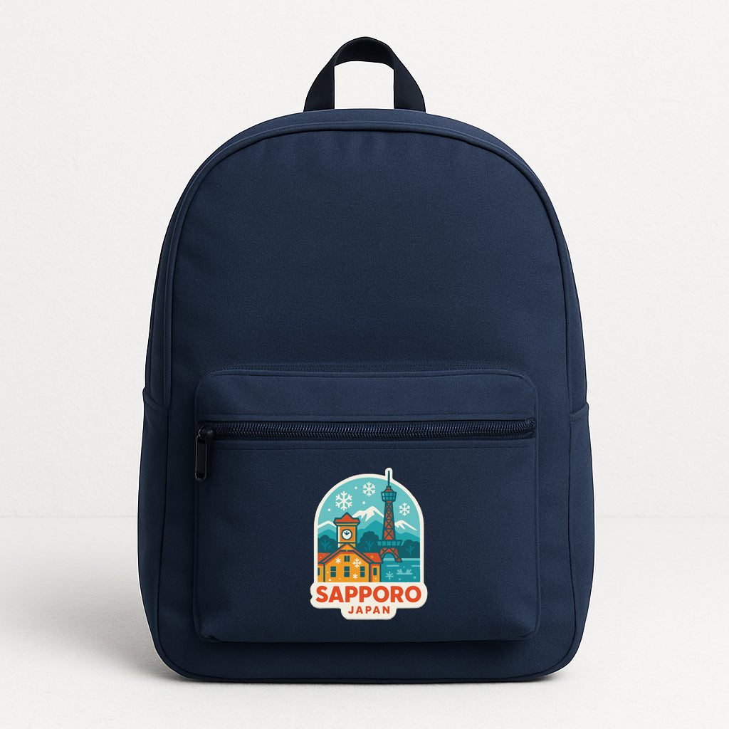 A navy blue backpack with a sticker on the front that says "SAPPORO JAPAN".