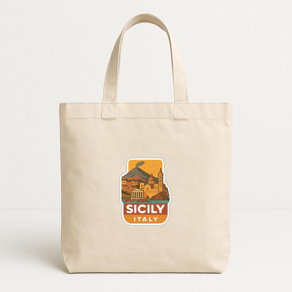 A beige tote bag with a printed design depicting a cityscape and the text "SICILY ITALY" printed on it.