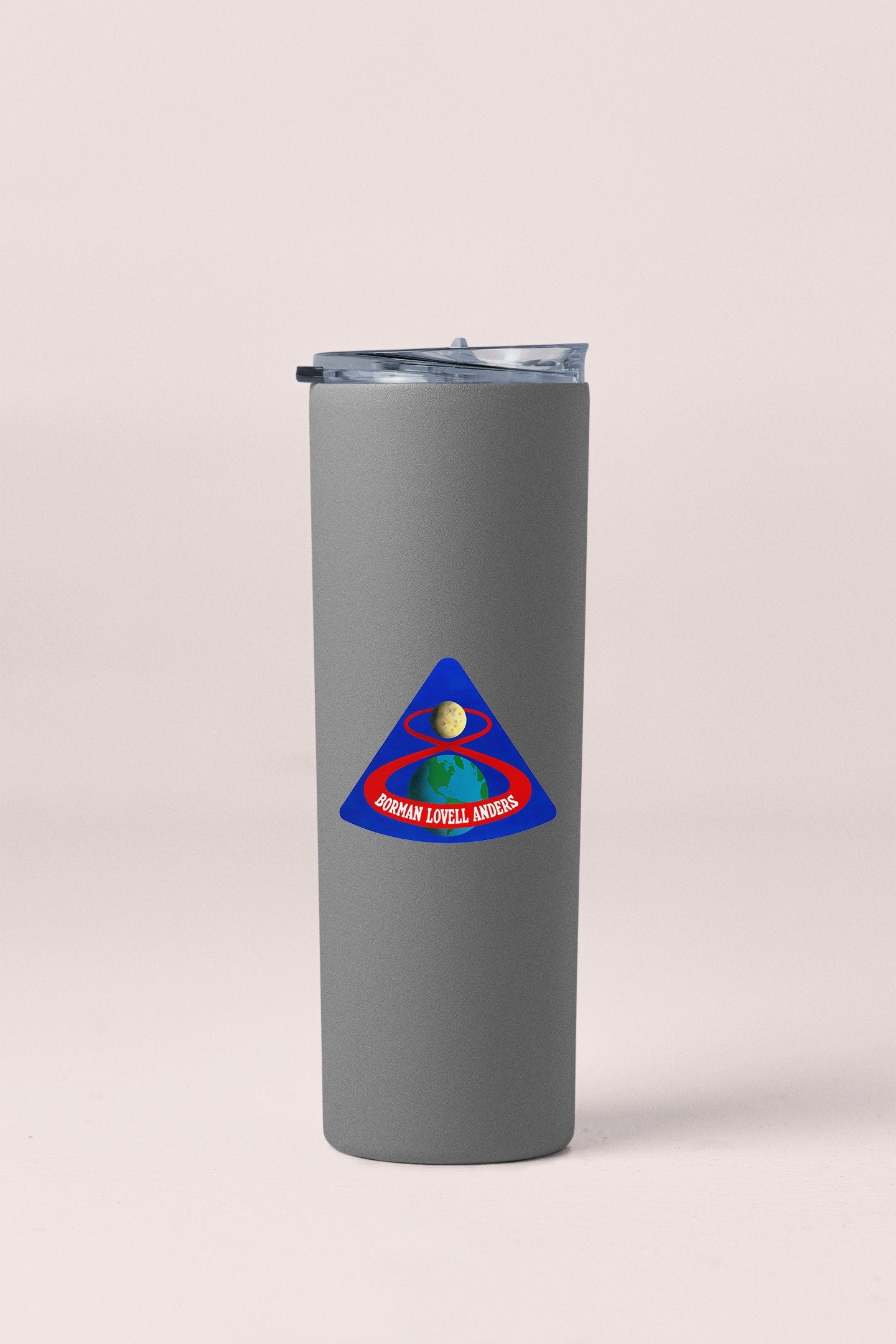 a stainless steel tumbler with a blue triangle and a red triangle on it