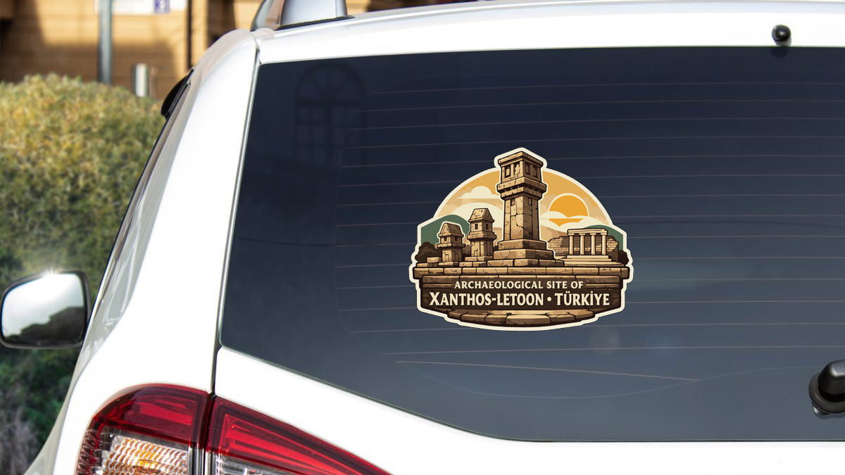 a sticker on the rear window of a car, depicting an illustration of an archaeological site.