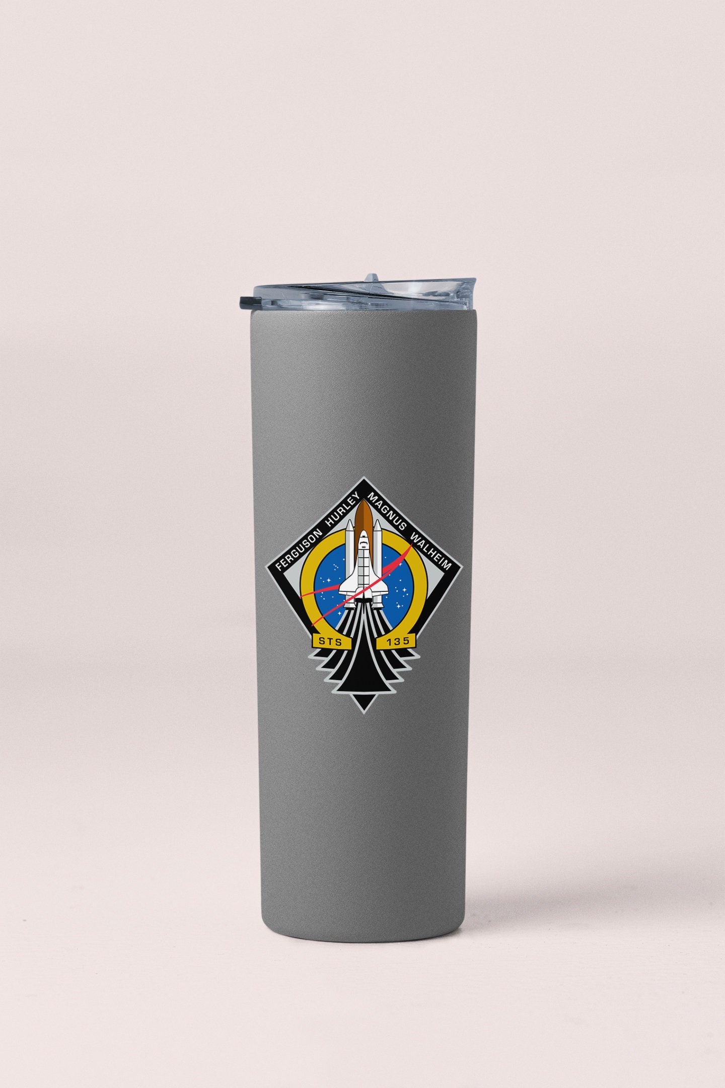 a stainless steel tumbler with a picture of a woman on it