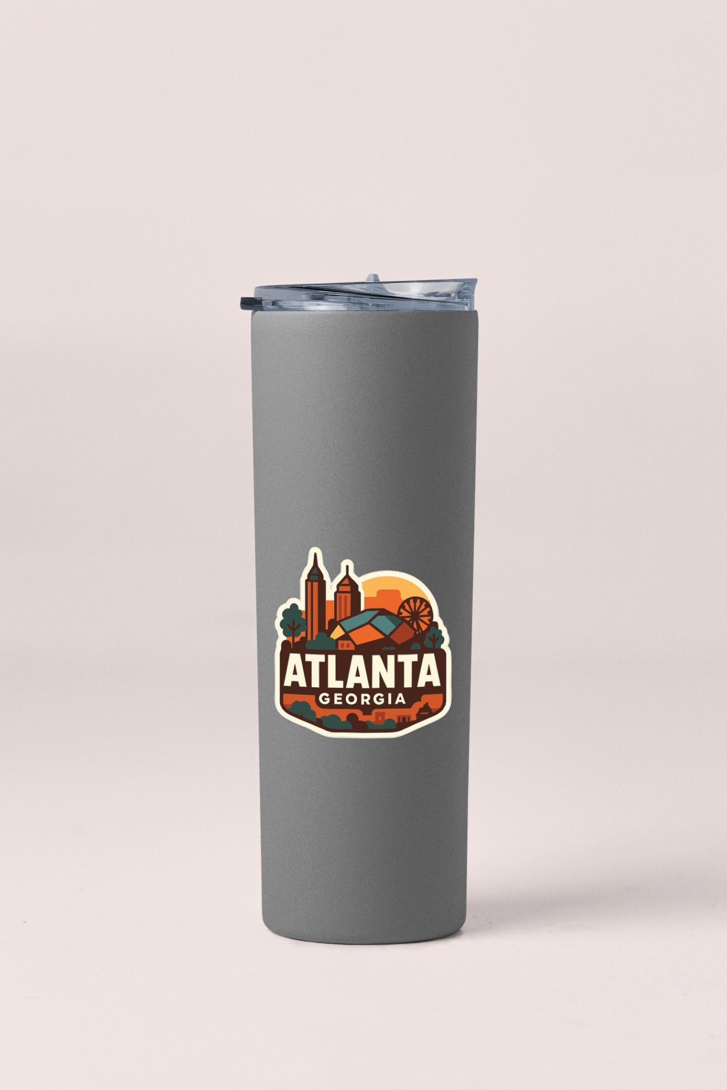 A gray insulated tumbler with a printed Atlanta Georgia logo on it.