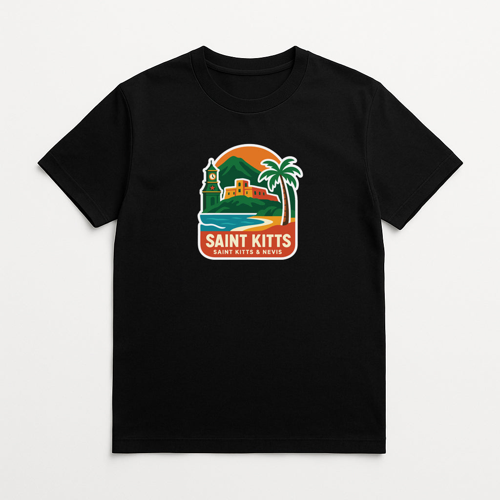 A black t-shirt with a colorful graphic design depicting a tropical beach scene, including a palm tree, a building, and a sunset.